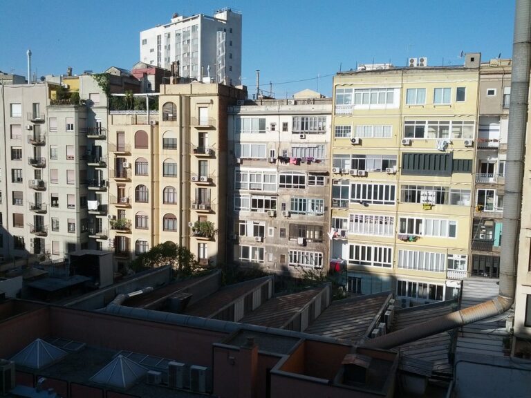 Apartment balcony overlooking a city view, similar to Downtown Collection homes