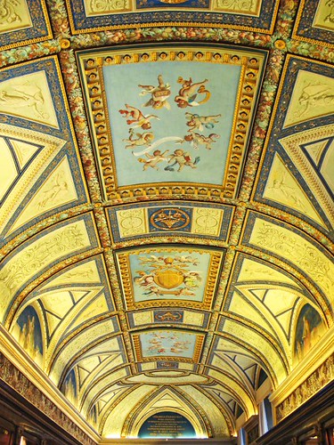 Interior of an art museum gallery with paintings on display